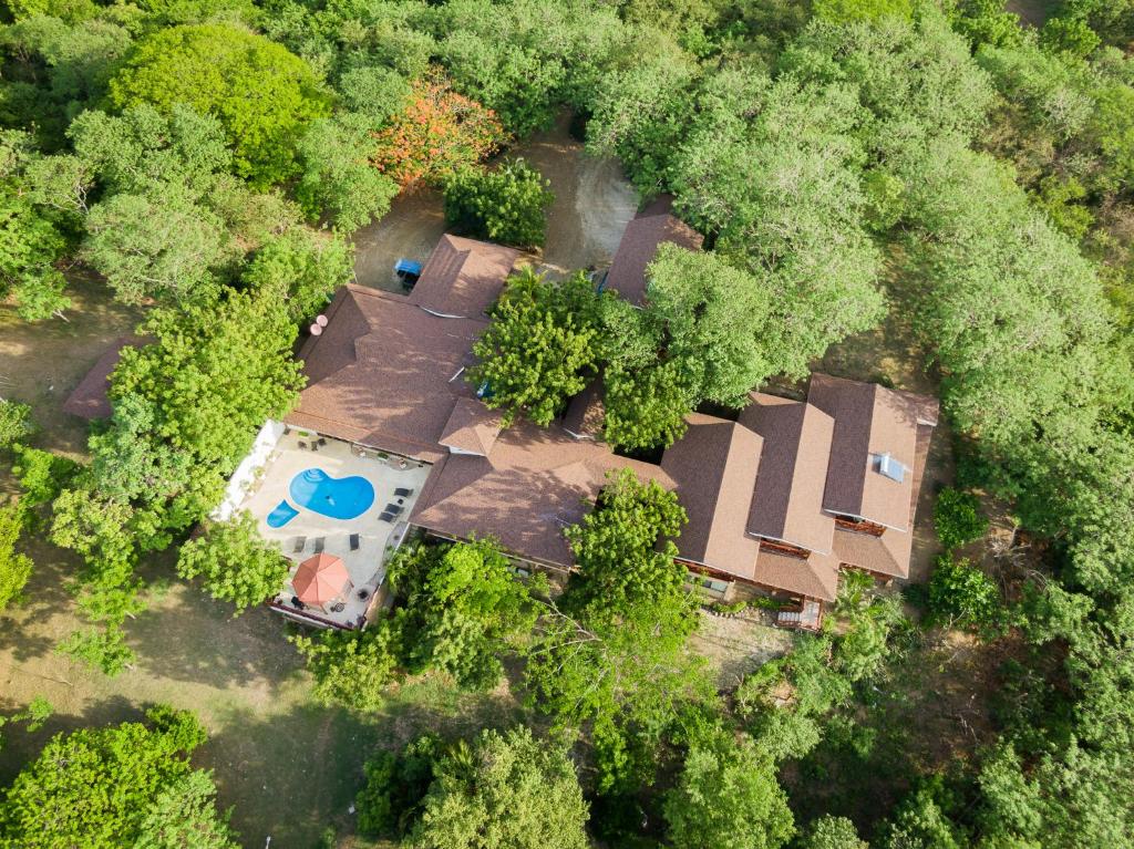 an overhead view of a house in the forest at Rancho Humo Estancia in Puerto Humo
