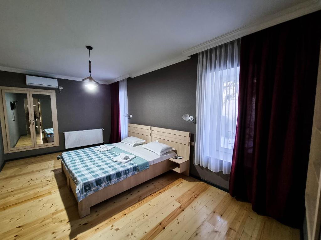 Postel nebo postele na pokoji v ubytování Varga Kvareli