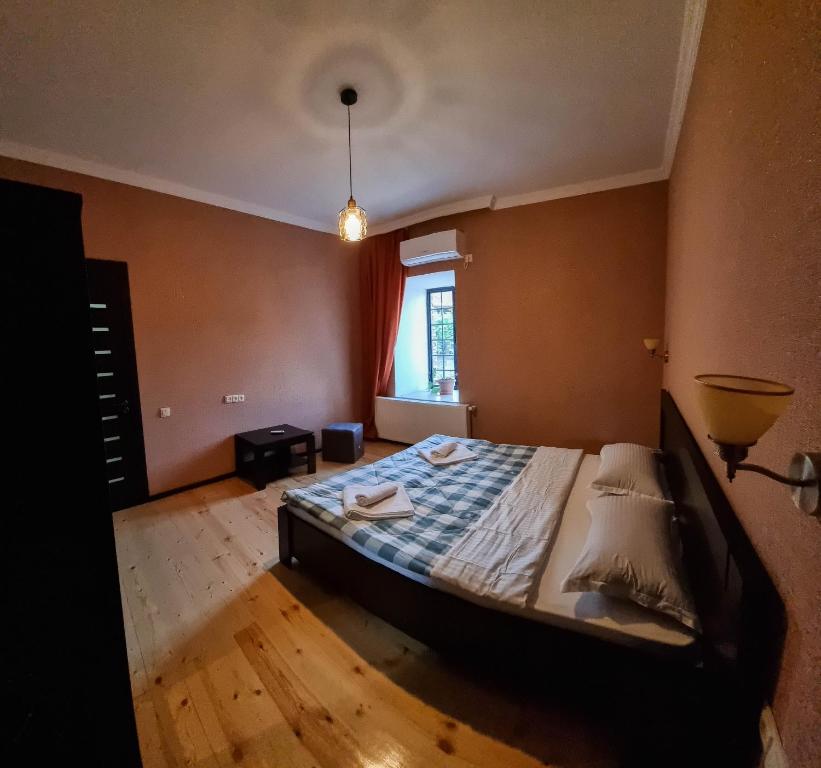 Postel nebo postele na pokoji v ubytování Varga Kvareli