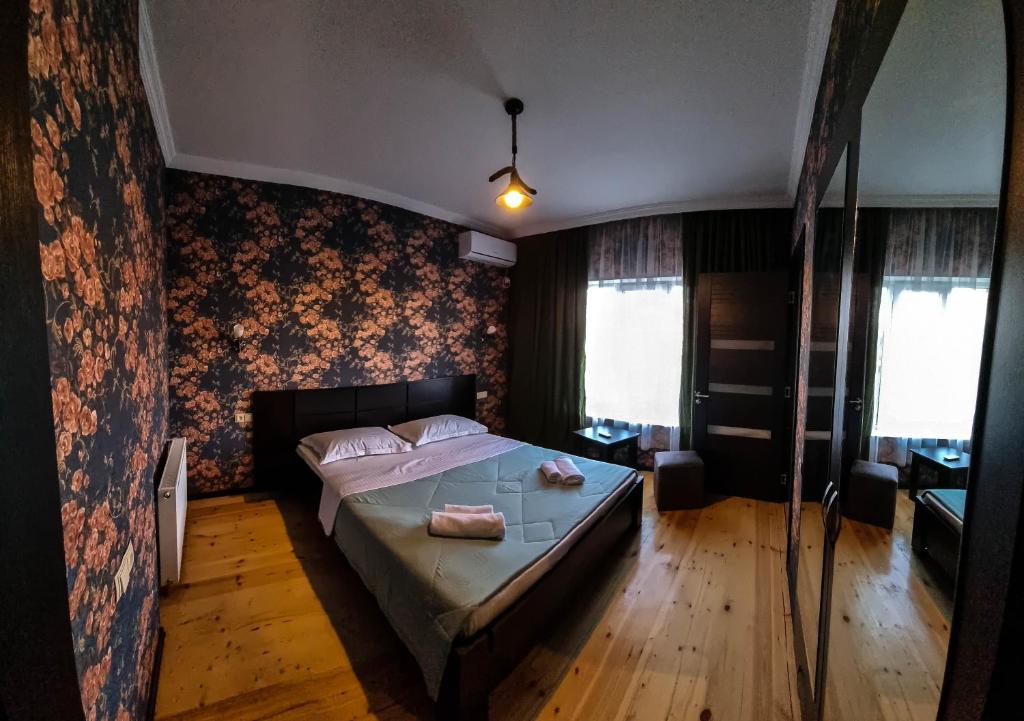 Postel nebo postele na pokoji v ubytování Varga Kvareli