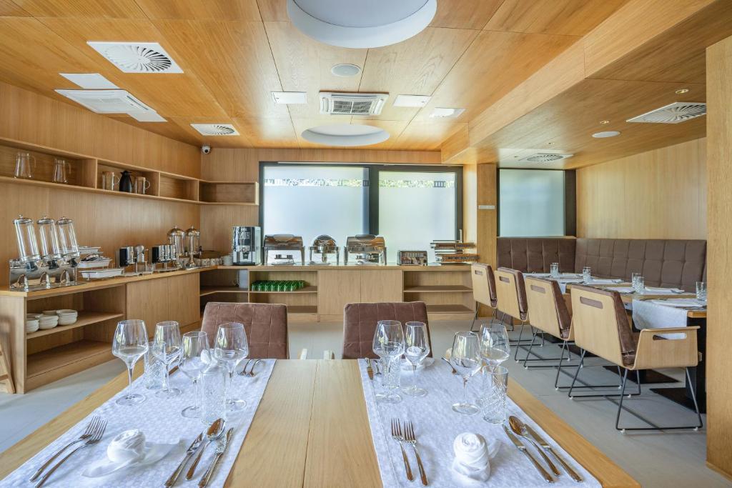 Reštaurácia alebo iné gastronomické zariadenie v ubytovaní Hotel Palcich Plitvice