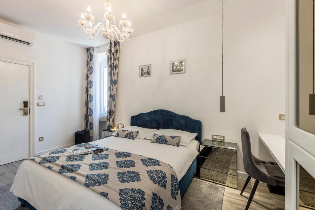 Postel nebo postele na pokoji v ubytování Elixir luxury rooms
