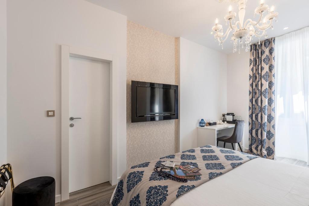TV a/nebo společenská místnost v ubytování Elixir luxury rooms