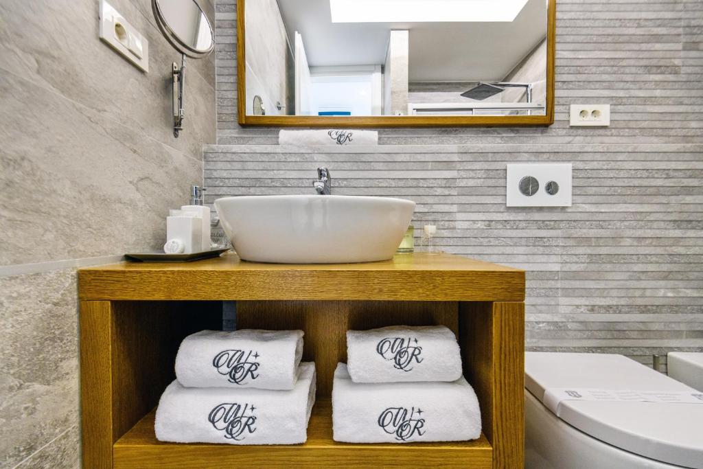 Kúpeľňa v ubytovaní Windrose Design Apartments