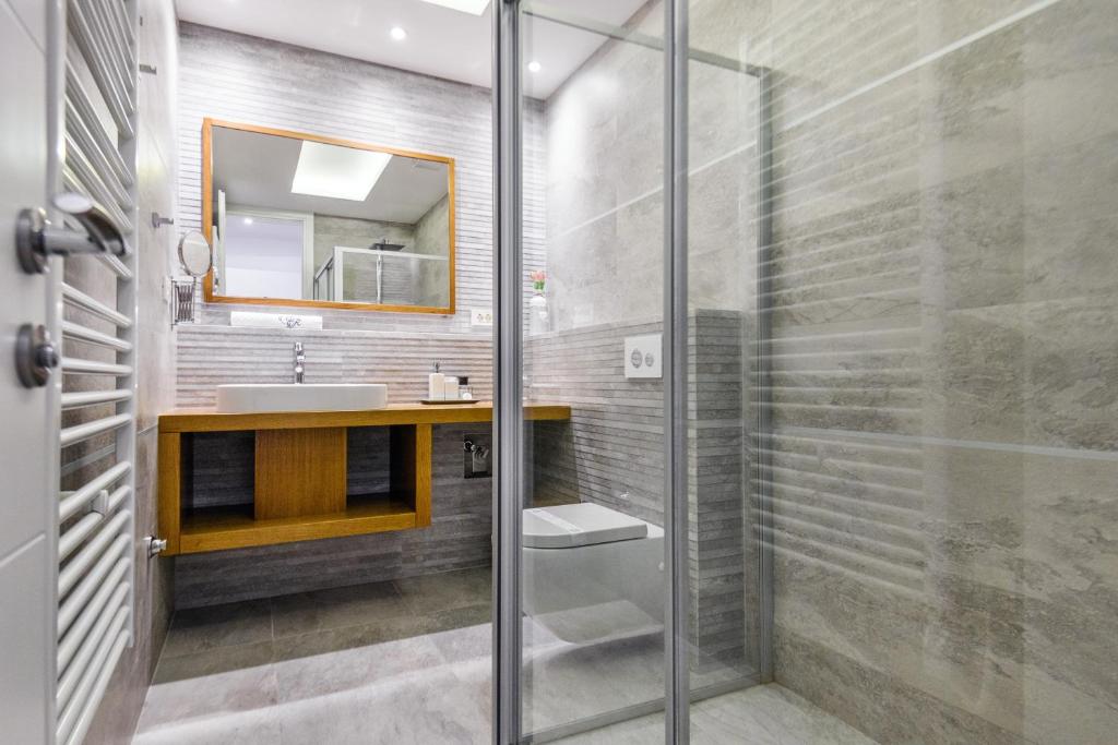 Kúpeľňa v ubytovaní Windrose Design Apartments