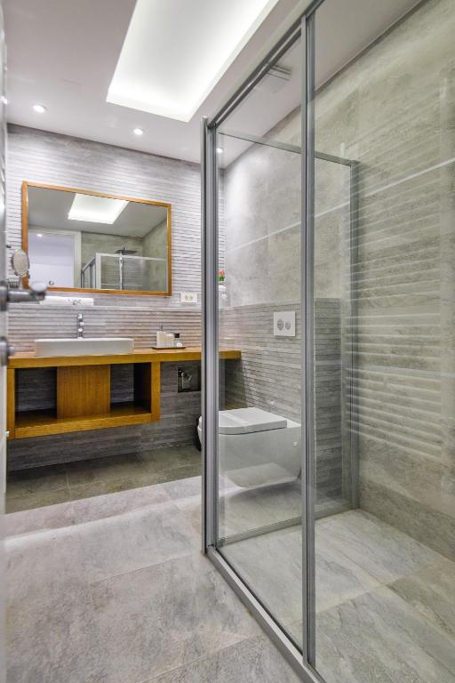 Kúpeľňa v ubytovaní Windrose Design Apartments