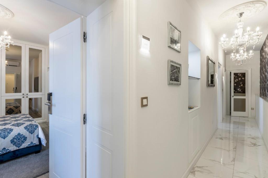 Postel nebo postele na pokoji v ubytování Elixir luxury rooms
