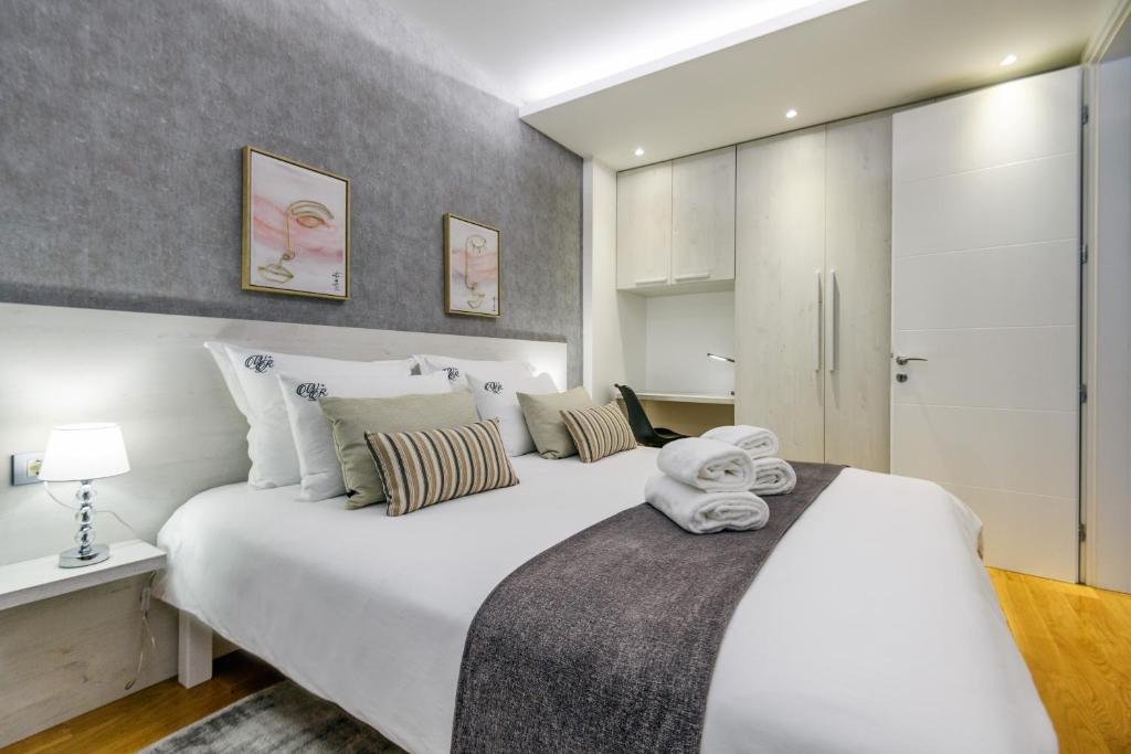 Posteľ alebo postele v izbe v ubytovaní Windrose Design Apartments