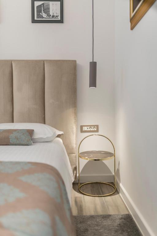 Postel nebo postele na pokoji v ubytování Elixir luxury rooms