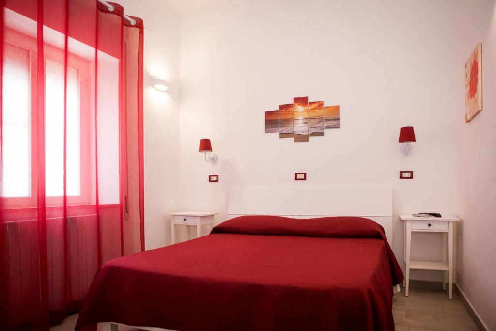 Postel nebo postele na pokoji v ubytování B&B La Pineta