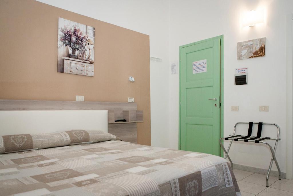 Postel nebo postele na pokoji v ubytování B&B La Pineta