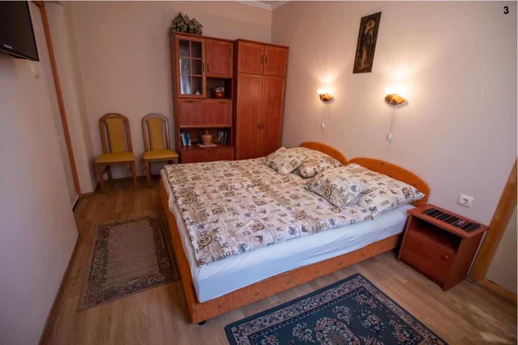 Posteľ alebo postele v izbe v ubytovaní Akácfa 13 Apartman