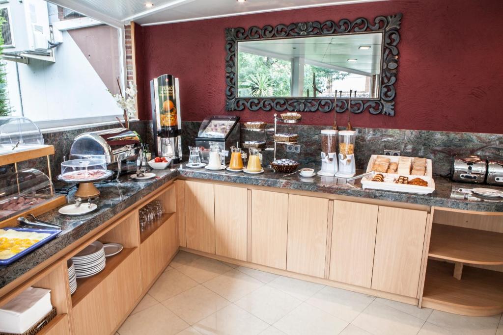 Kuchyň nebo kuchyňský kout v ubytování PARK SEDO Aparthotel