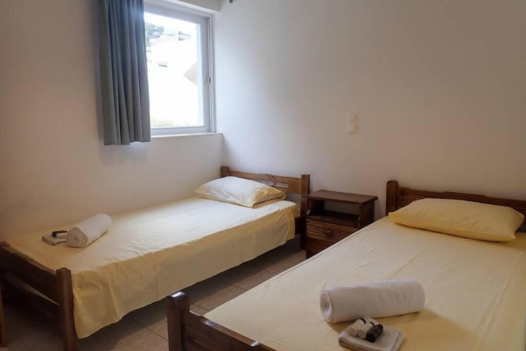 Postel nebo postele na pokoji v ubytování Urban Blue House