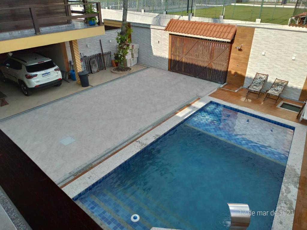 Bazén v ubytování GARATUCAIA - Suites Casa de Madeira nebo v jeho okolí