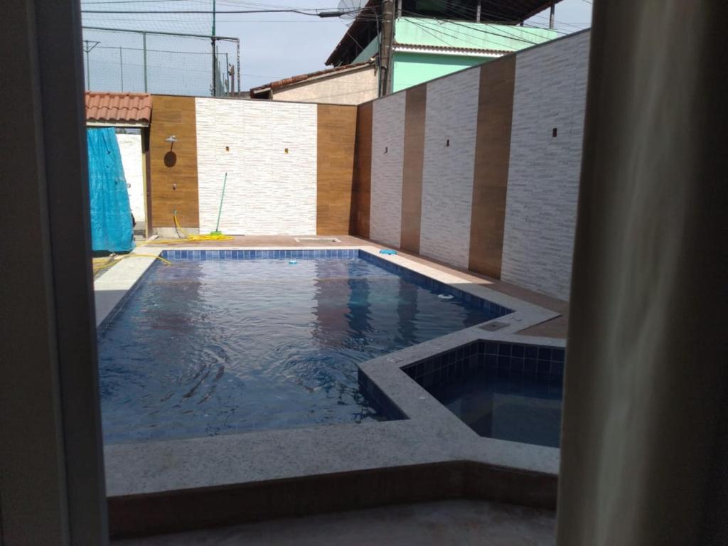 Bazén v ubytování GARATUCAIA - Suites Casa de Madeira nebo v jeho okolí