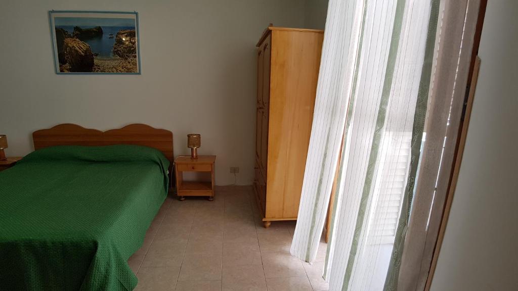 Postel nebo postele na pokoji v ubytování Casa Vittorio B&b