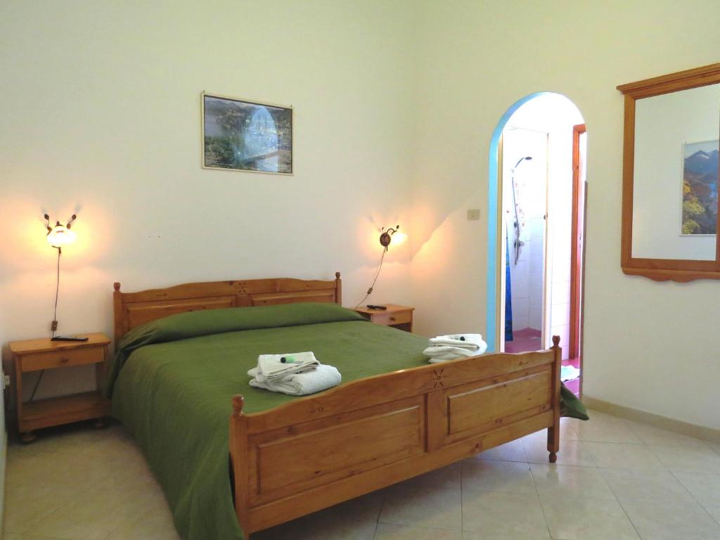 Postel nebo postele na pokoji v ubytování Casa Vittorio B&b