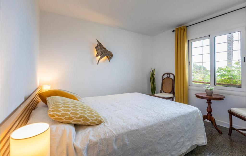 A bed or beds in a room at Lovely Home In Lloret Del Mar