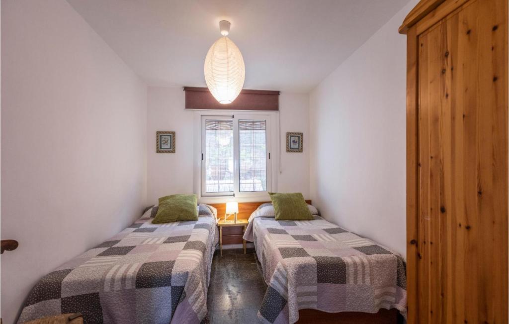 A bed or beds in a room at Lovely Home In Lloret Del Mar