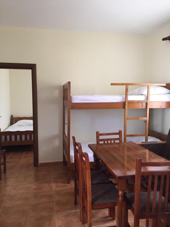 Postel nebo postele na pokoji v ubytování Shyqi Apartments