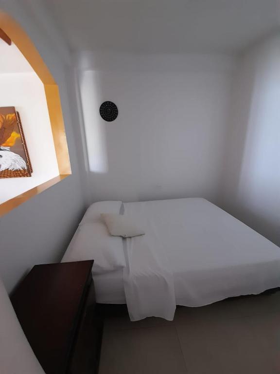 Postel nebo postele na pokoji v ubytování Apartamento Opaa