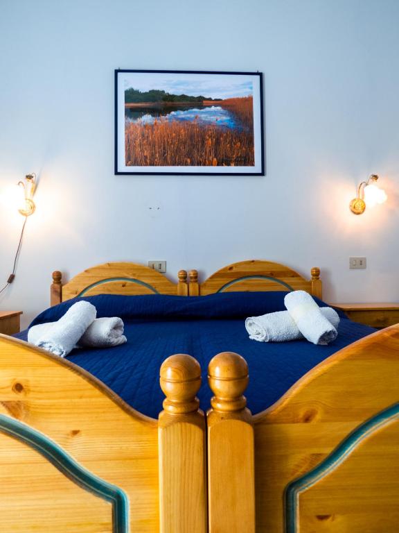 Postel nebo postele na pokoji v ubytování Casa Vittorio B&b