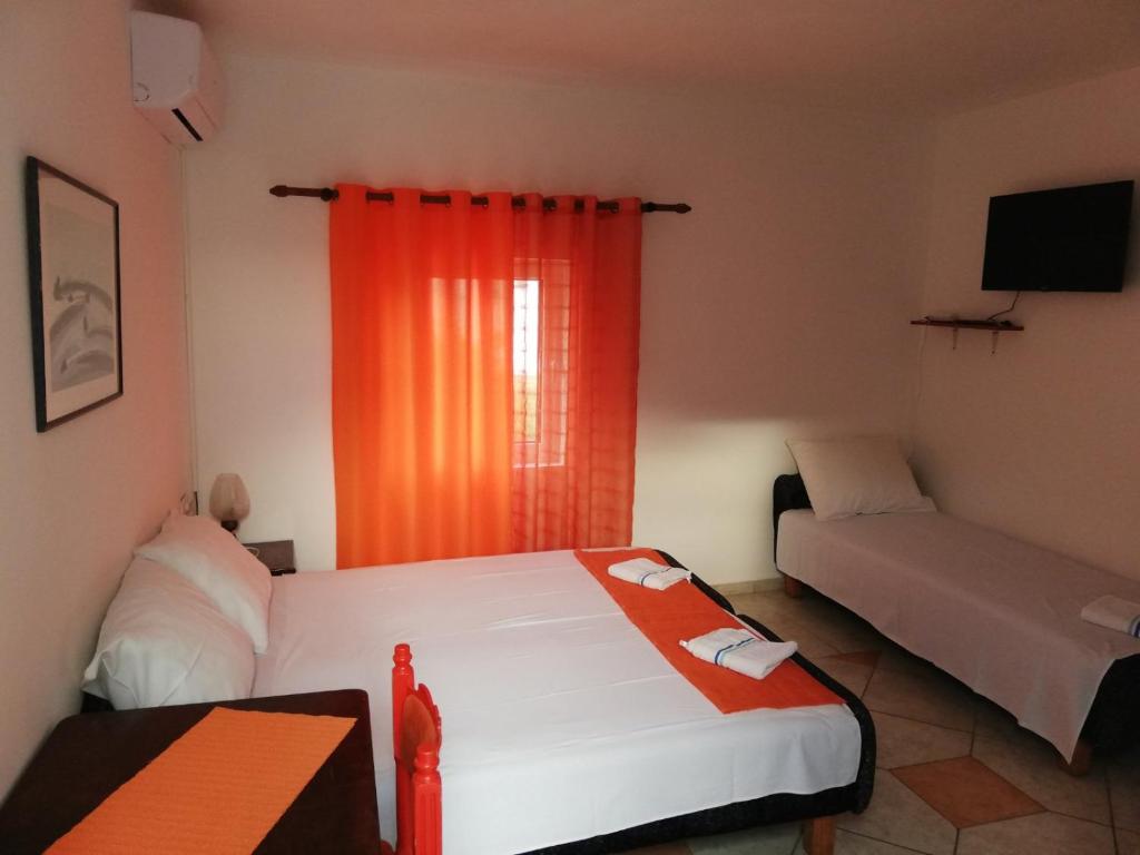 Postel nebo postele na pokoji v ubytování Casa Bianca