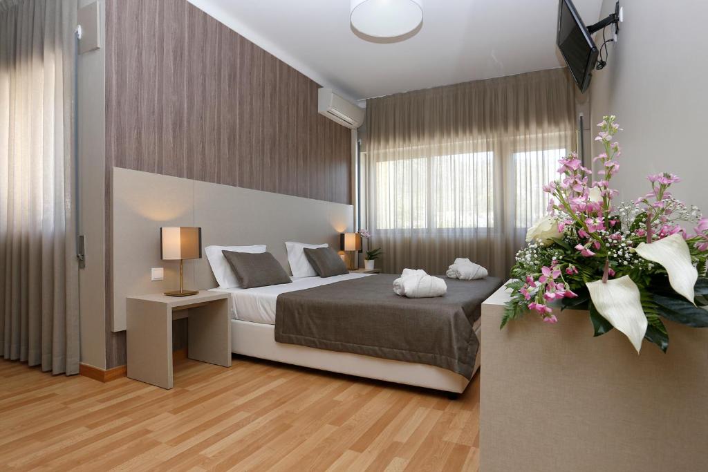 Katil atau katil-katil dalam bilik di Hotel Douro Inn