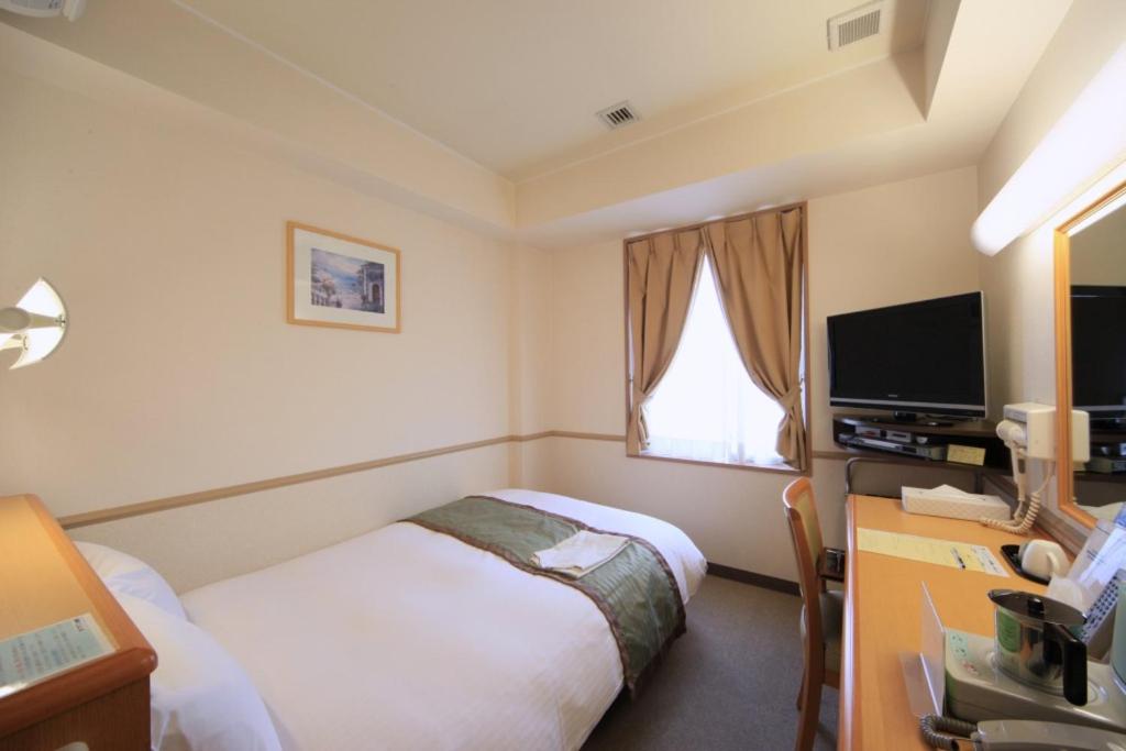 Crown Hills Tsuchiuraekihigashiにあるテレビまたはエンターテインメントセンター
