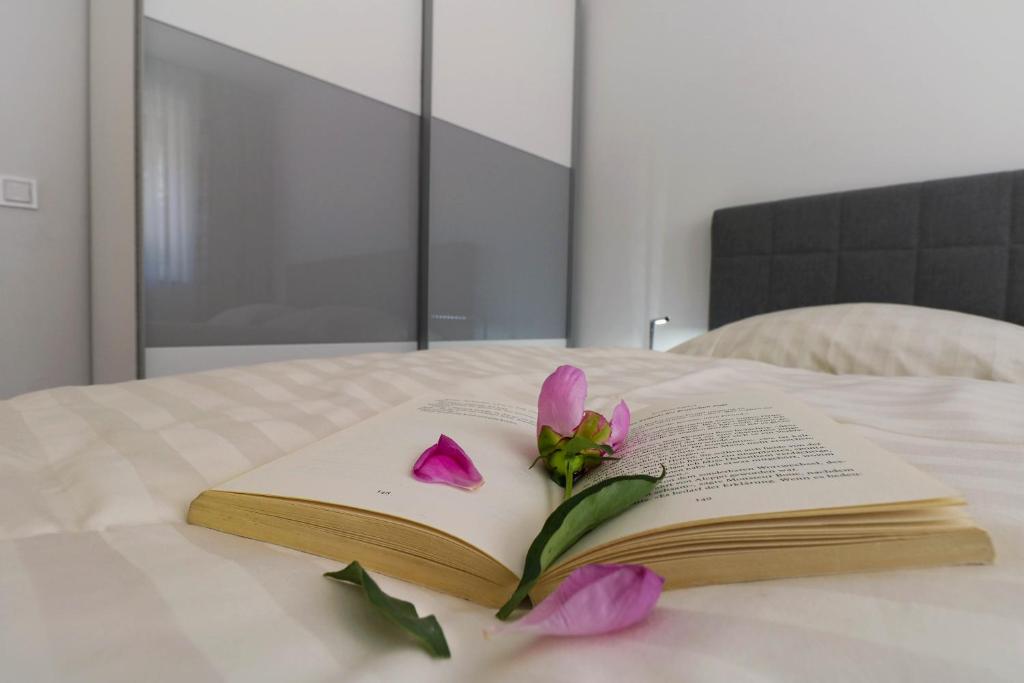 Postel nebo postele na pokoji v ubytování Papillon i Dolce Vita