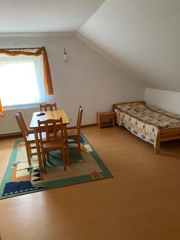 Posteľ alebo postele v izbe v ubytovaní Agroturystyka Marysieńka