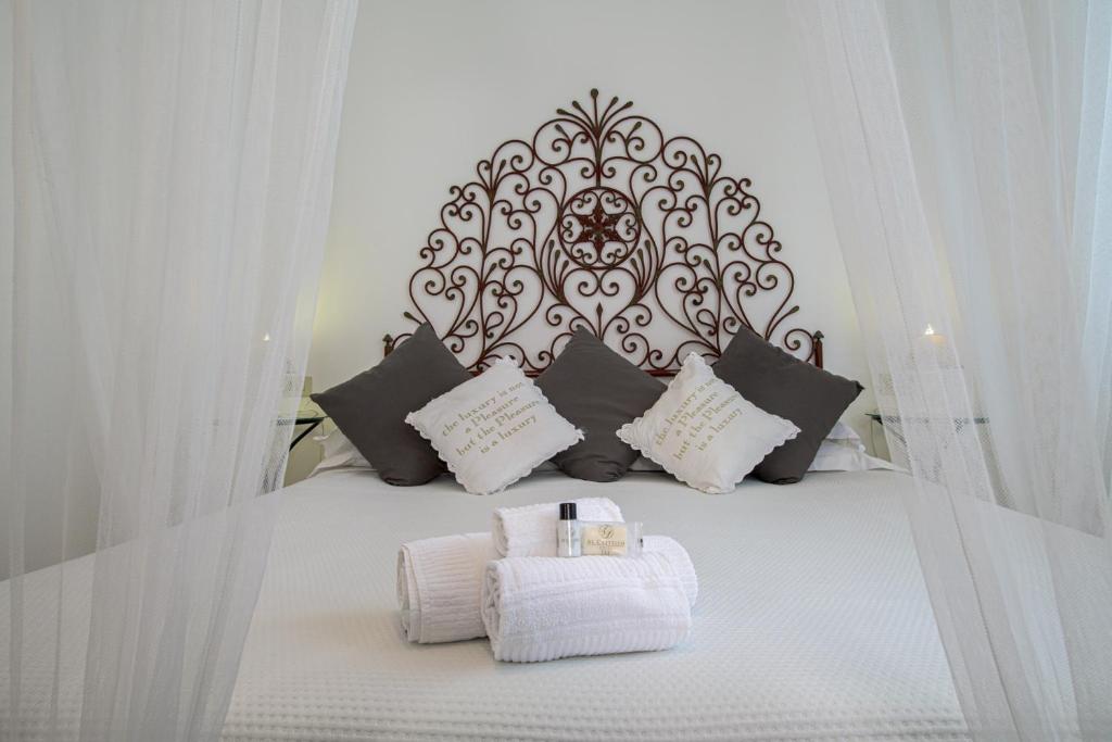 Postel nebo postele na pokoji v ubytování Albergo Al Castello