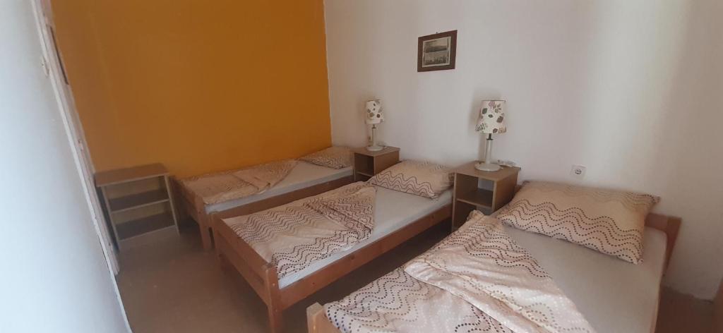 Postel nebo postele na pokoji v ubytování Aqua Hostel