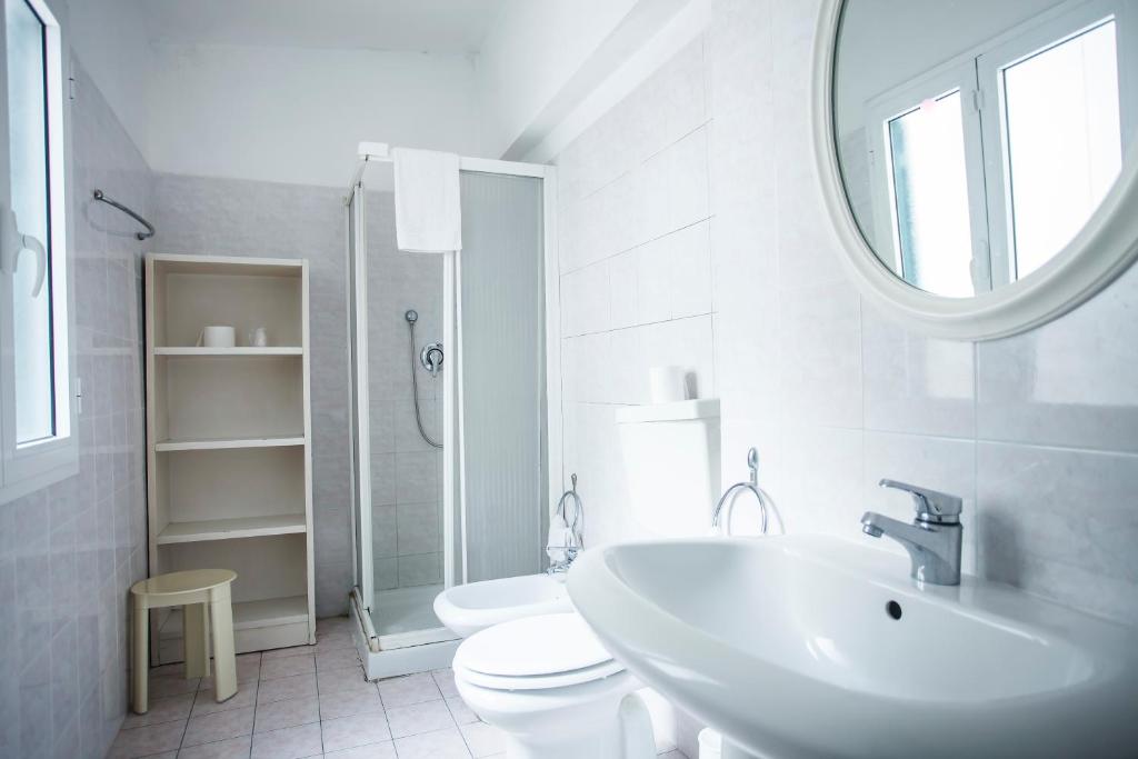 Koupelna v ubytování Hotel Rex