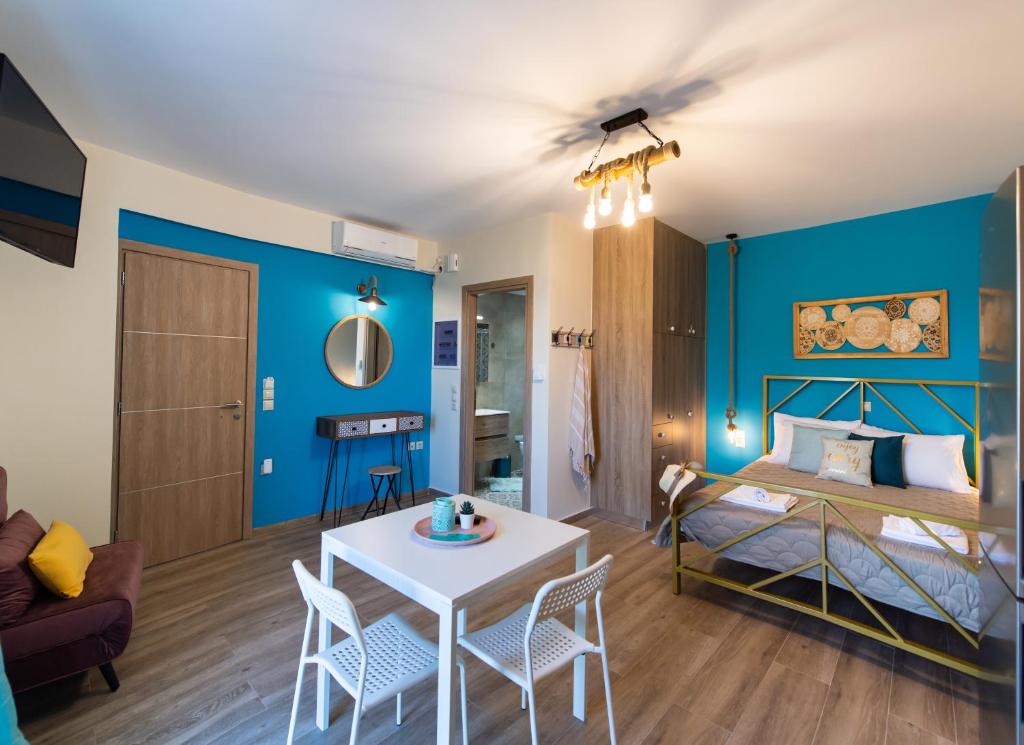 Кровать или кровати в номере Casa De Blue