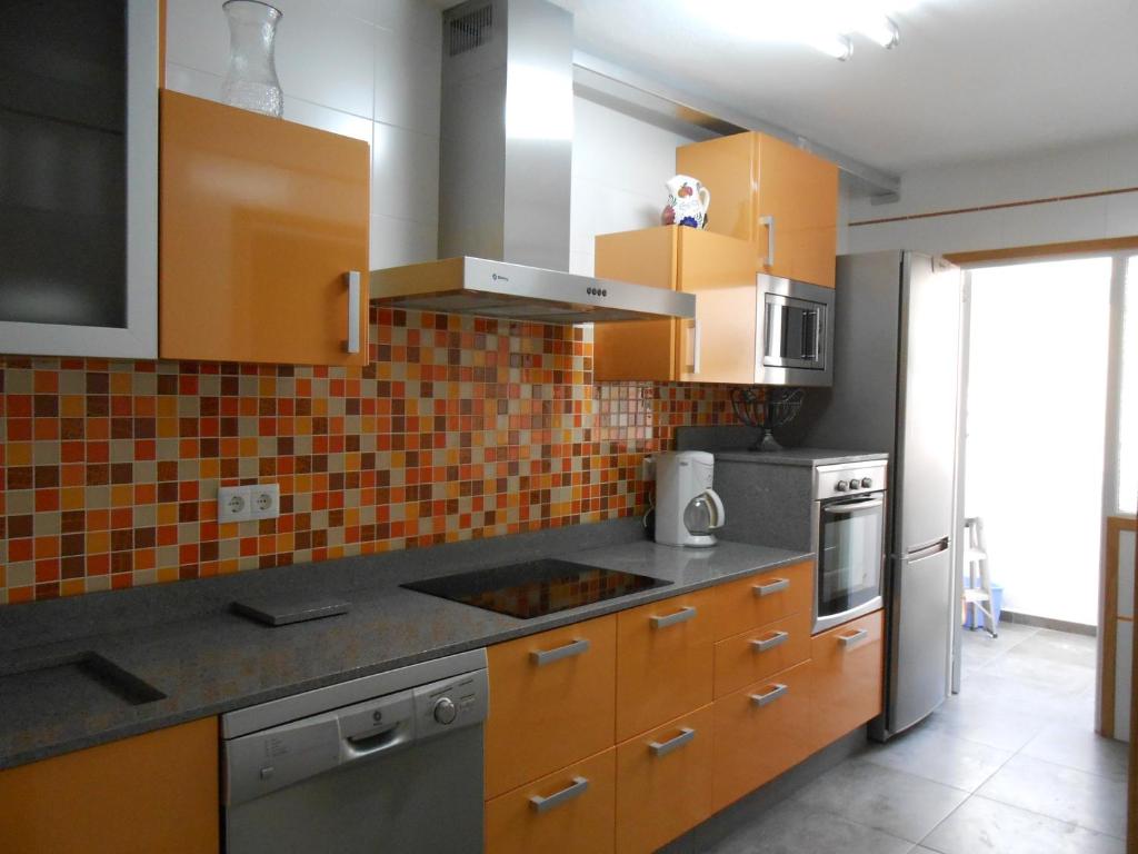 Kuchyň nebo kuchyňský kout v ubytování Piso acogedor en el Centro de Estepona