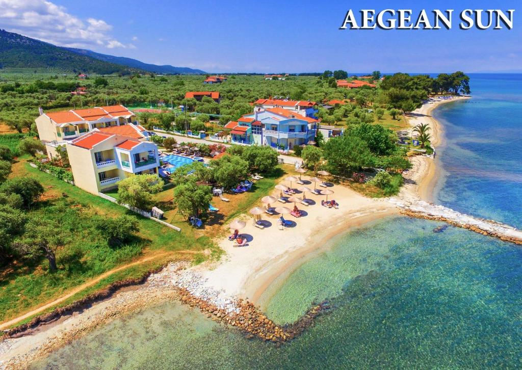 an aerial view of a resort on a beach at Aegean Sun Hotel in Skala Rachoniou
