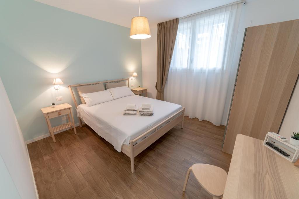 Postel nebo postele na pokoji v ubytování Natura e Mente Camere e Relax