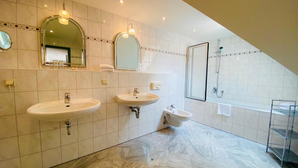 Koupelna v ubytování Hotel Erbgericht