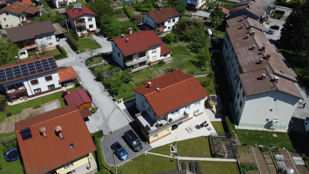 an overhead view of a house with roofs at Apartment and room Anica in Tolmin