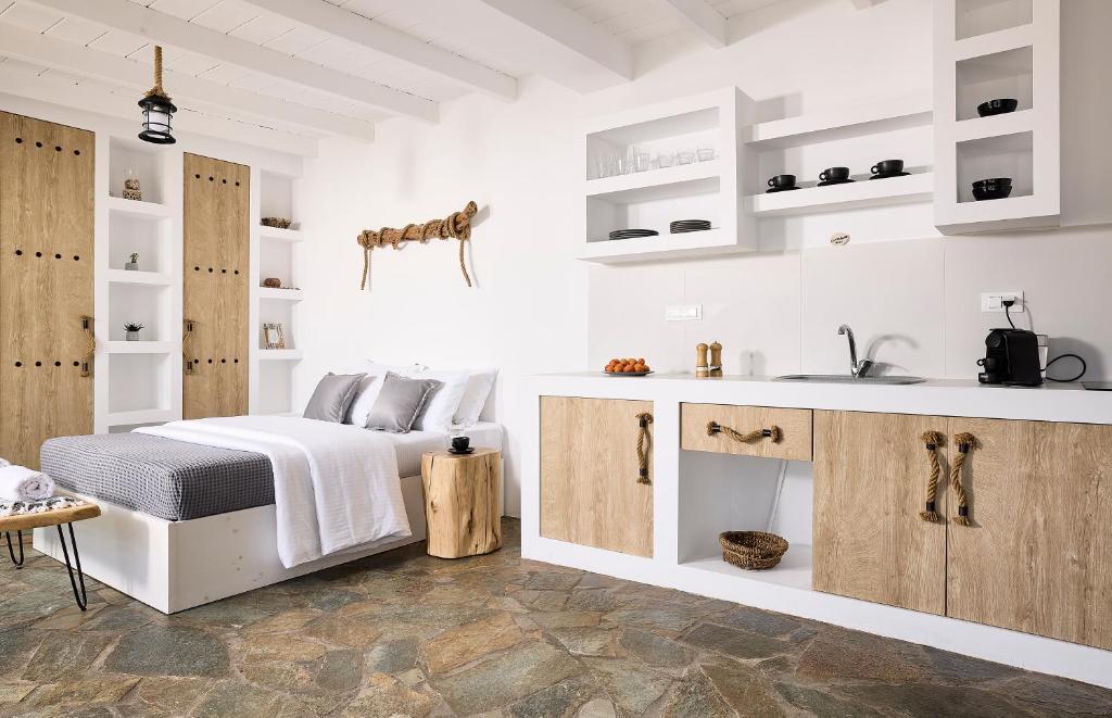 Kuchyň nebo kuchyňský kout v ubytování Cinco Suites
