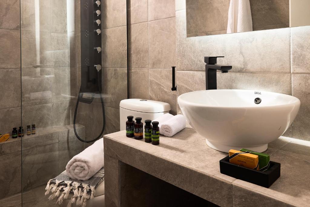 Koupelna v ubytování Cinco Suites