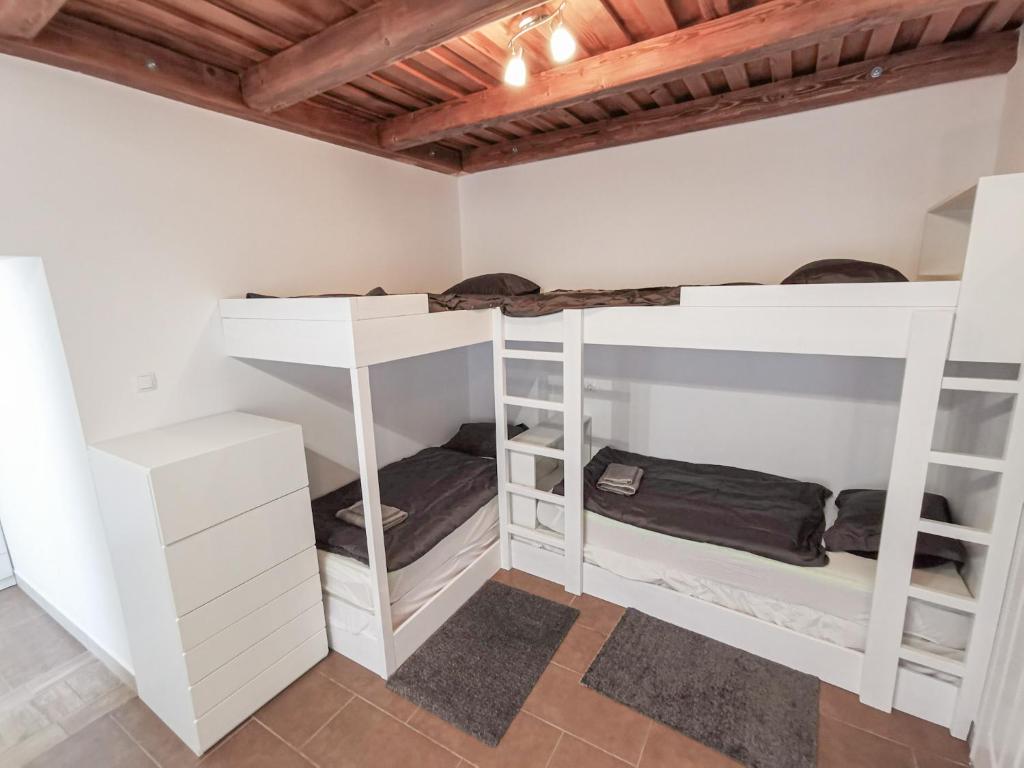 Postel nebo postele na pokoji v ubytování Greenfield Apartman