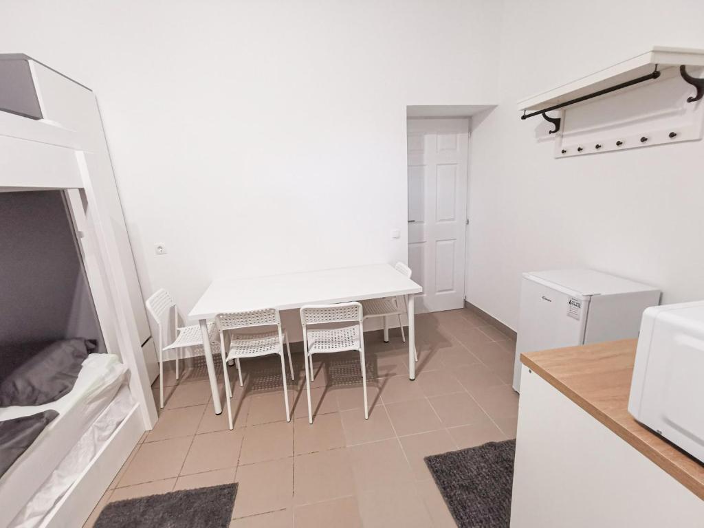 Kuchyň nebo kuchyňský kout v ubytování Greenfield Apartman