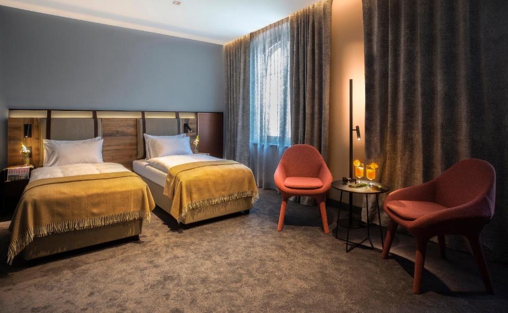 Postel nebo postele na pokoji v ubytování Hotel 1231