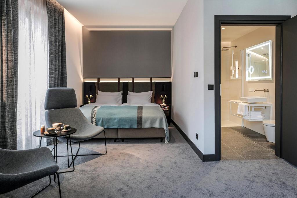 Postel nebo postele na pokoji v ubytování Hotel 1231