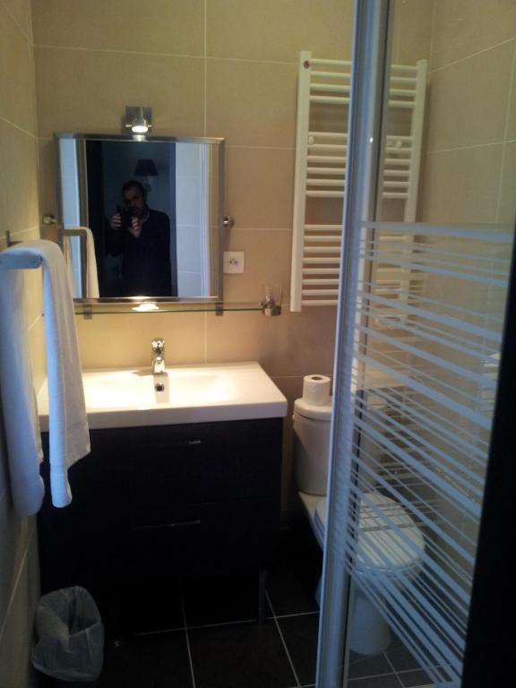 Koupelna v ubytování Hotel Azur