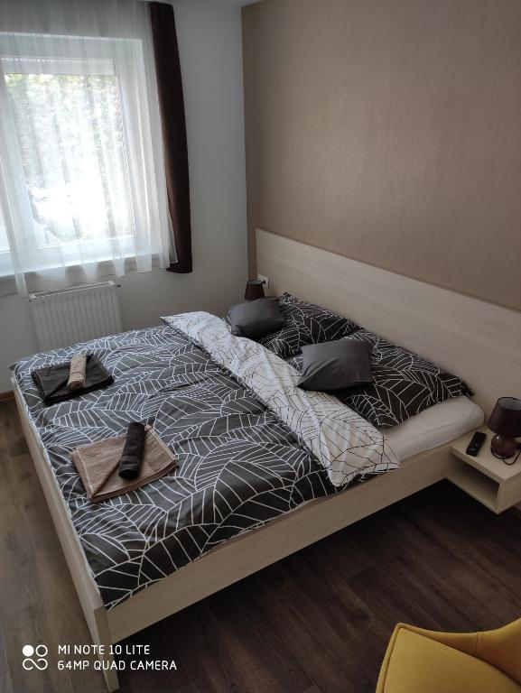 Posteľ alebo postele v izbe v ubytovaní Sweet Home Apartments