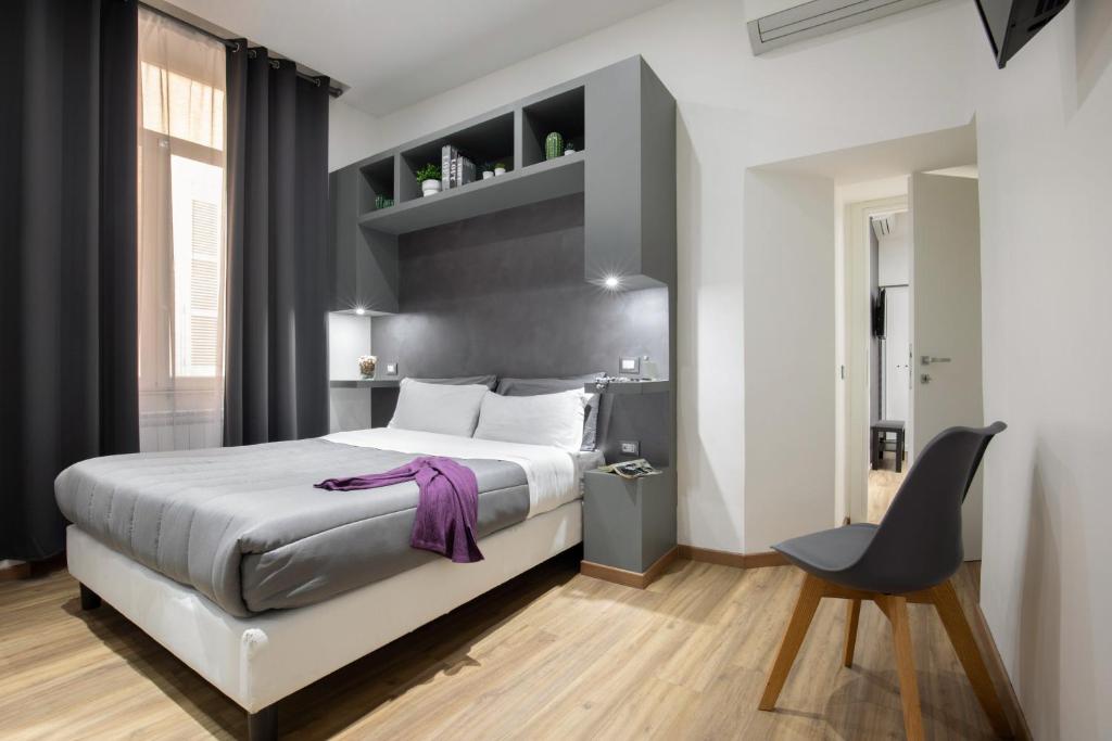 Кровать или кровати в номере Sant'Ambrogio 7